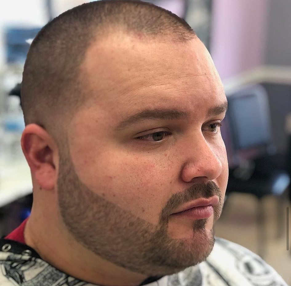 Haircut in progress at Olde Tyme Barber Shop